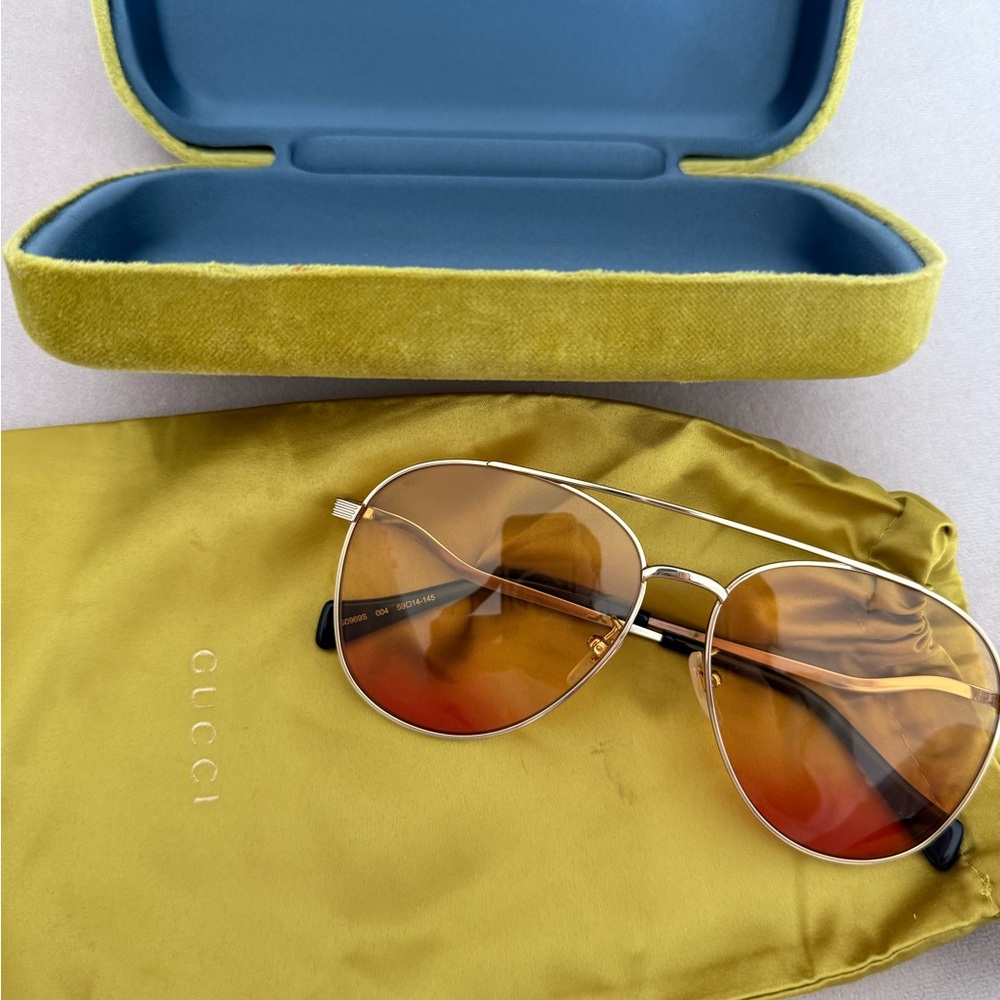 Gucci Gold Aviator Sunglasses with Orange Lenses